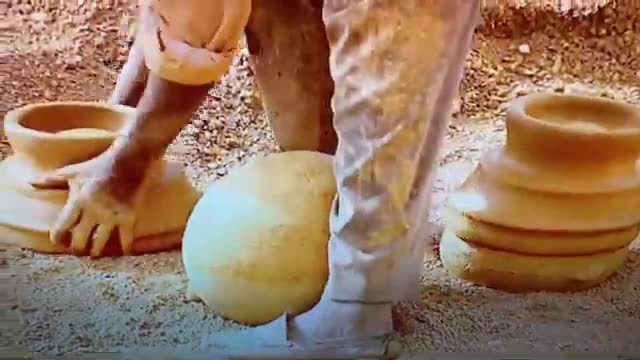 Pot of soil made by hand मातो को भाँडा