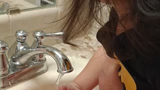 Baby washing hands