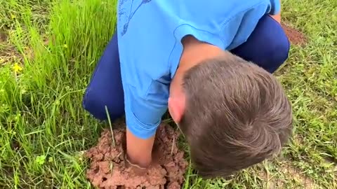 CATCHING CRAWFISH BY HAND