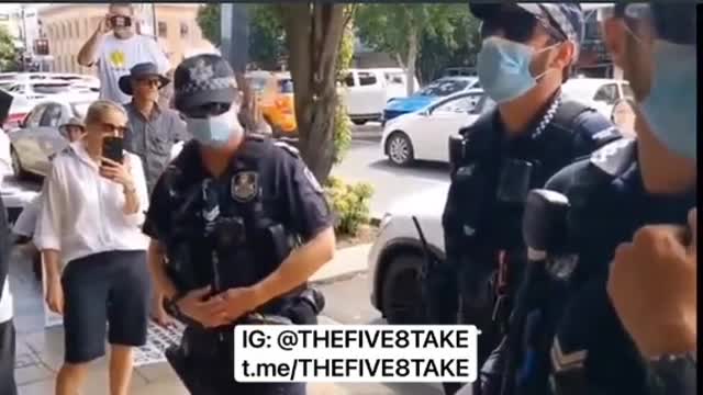 People in Queensland are preventing police from entering the building to ''talk to the owner,''