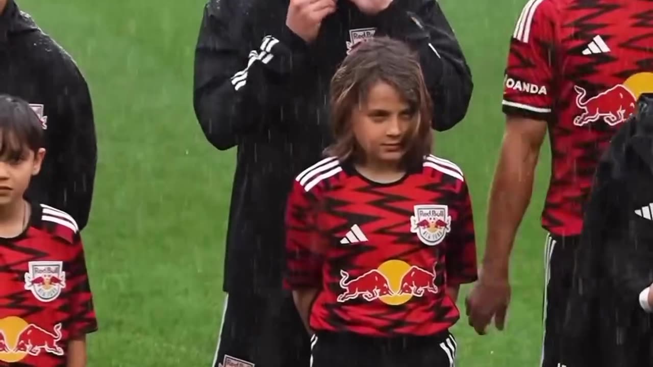 The wholesome moment new york red bulls take off their coats to give them to player escorts