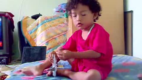 Funny Curly Hair Kids with his Plane