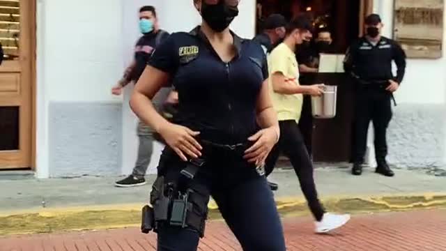 Dancing beautiful Cop