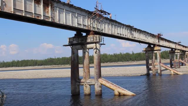 Large Truck Crosses Lofty Narrow Bridge