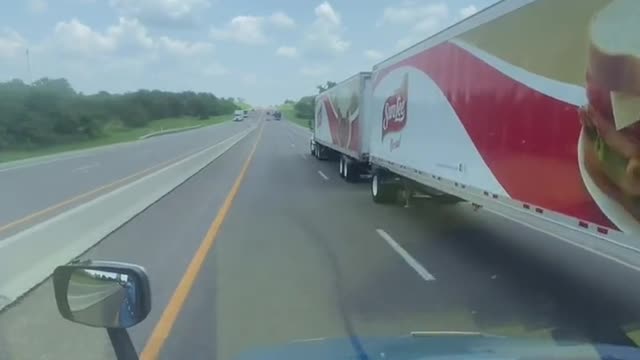 Look at the toll booth, look at the 53-foot double container,