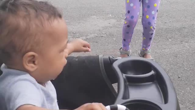 Baby laughs at sister skipping