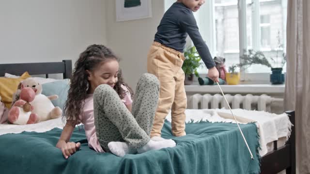 Children's Enjoying the Home Quarantine with Cute White Cat