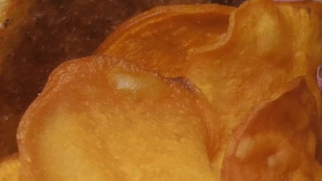 Potato chips arrangement and a sandwich split in two