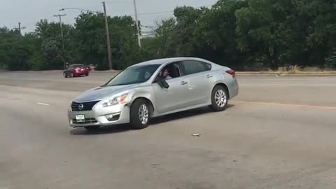 Lady Lets Car Roll into Oncoming Traffic with Child Inside