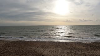 Sun is setting. On beach.