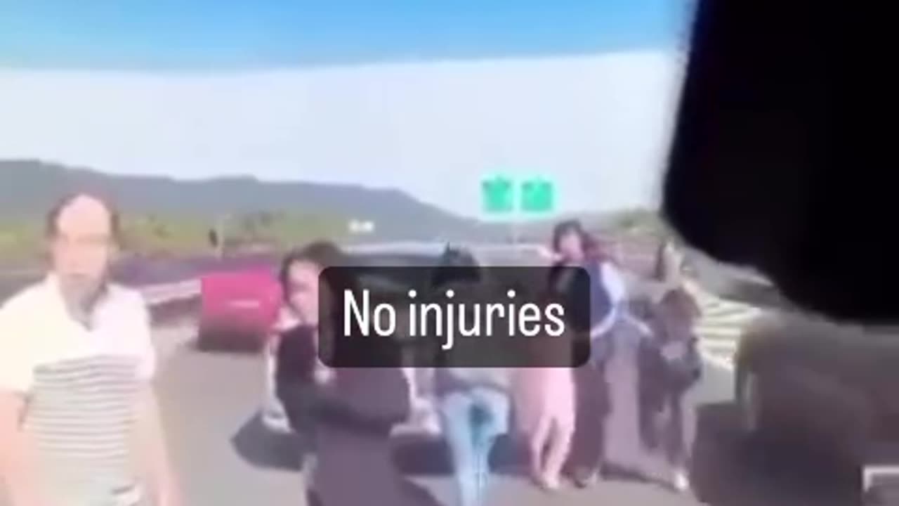 Pedestrians stopped in middle of road get hit