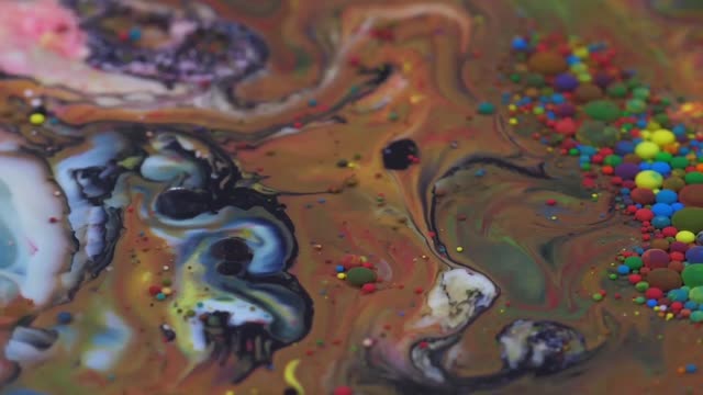 Mixture of paints and colored liquid balls