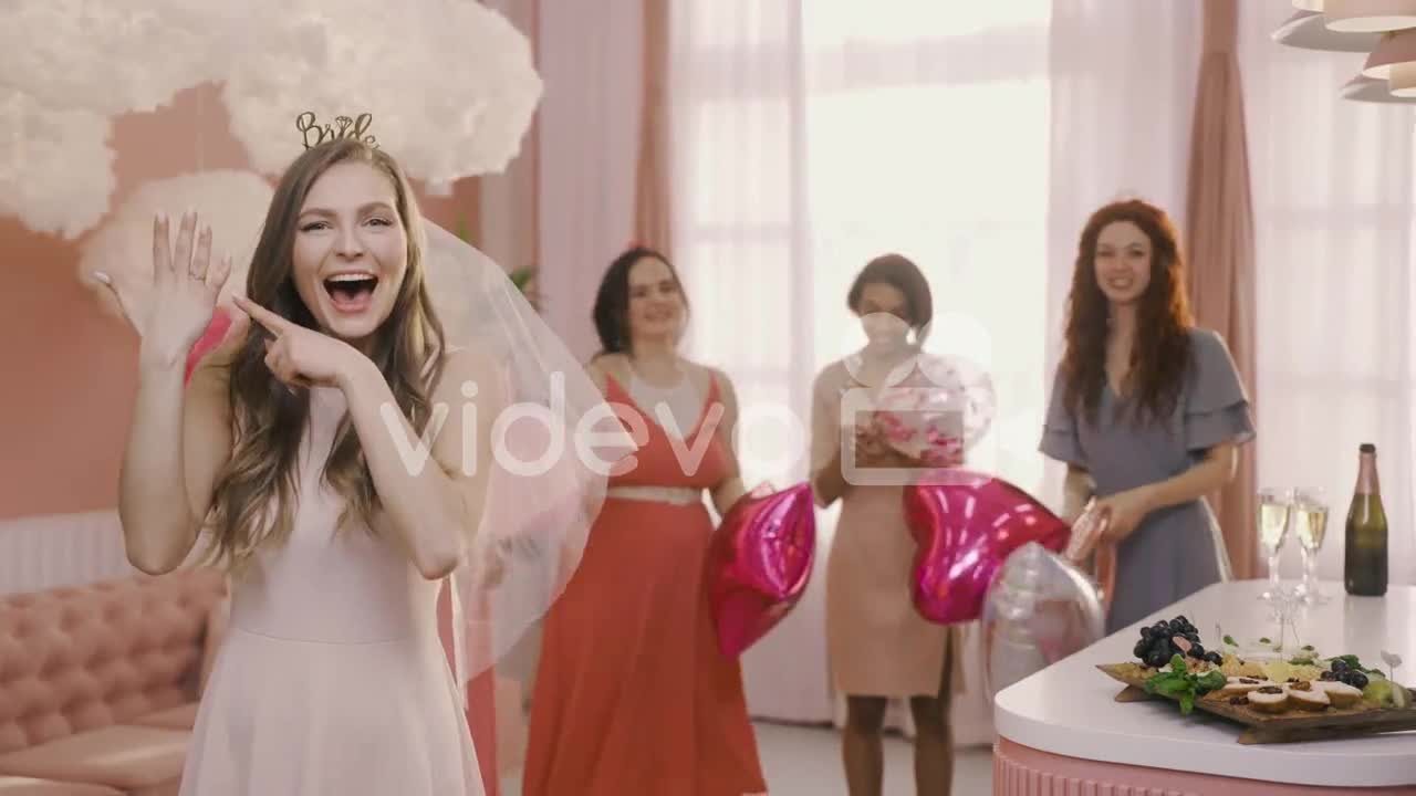 Happy Bachelor Girl Showing Her Engagement Ring To The Camera