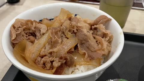 Buy Gyudon Using Vending Machine