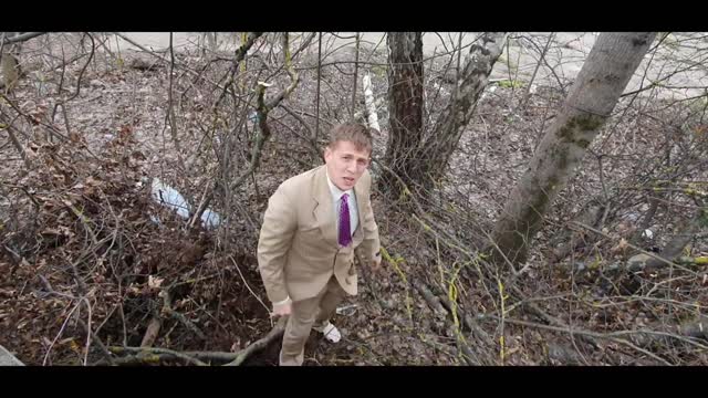 Climb over fences in a suit