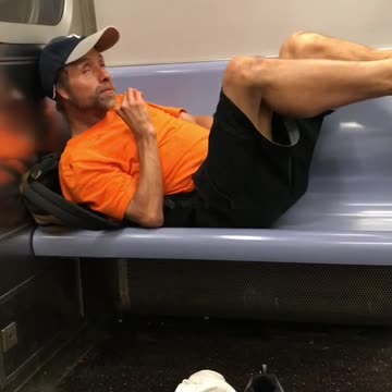 Make yourself at home dude man in orange shirt