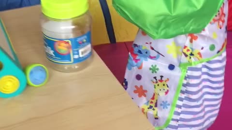 Using her table for chalk art