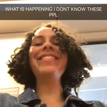 Girls touching hair denim jacket