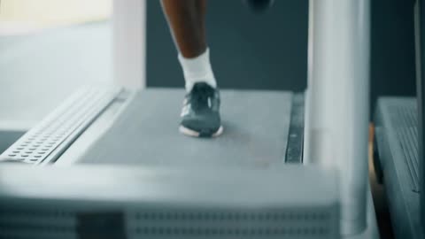 Mans Legs Whilst Running on Treadmill