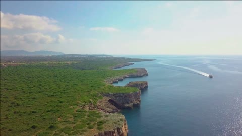 aerial landscape of the beautiful bay of cala mandia with a wonderful turquoise sea porto cristo