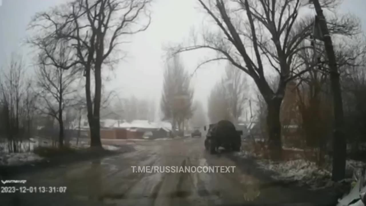 A Russian APC Loses Control and Plows into a Taxi