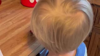 Grandson with popcorn popper 5/1/2021