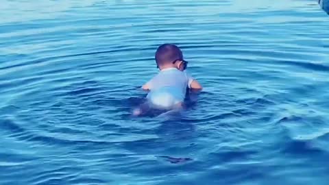 7-month-old already loves to go swimming