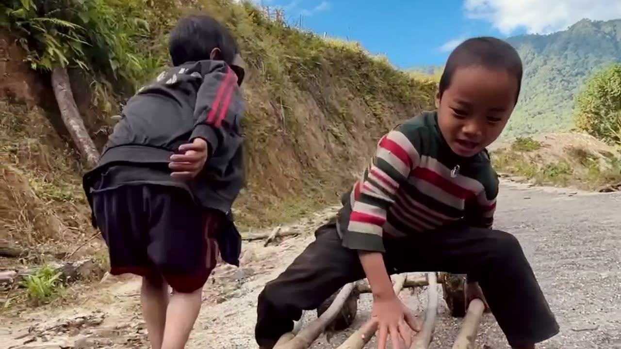 Children Play On Homemade Wood Vehicle