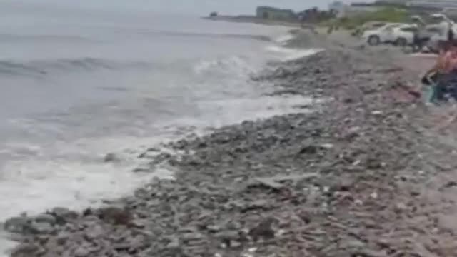 Surfing on the beach