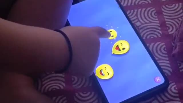 Baby Playing a cute mobile game 🎮