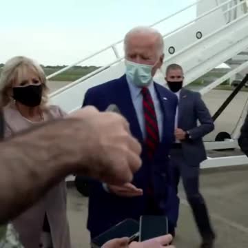 Dr. Jill Caught Physically Backing Joe Biden Away from Reporters at Airport After He Gets Stuck with His Hand Out