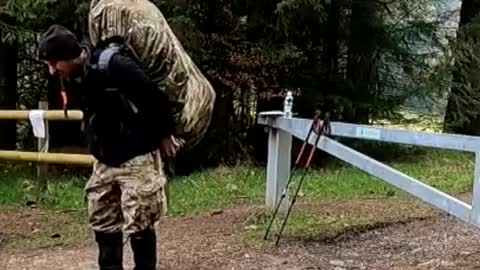 Putting on the osprey Atmos hiking bag. Fernworthy forest