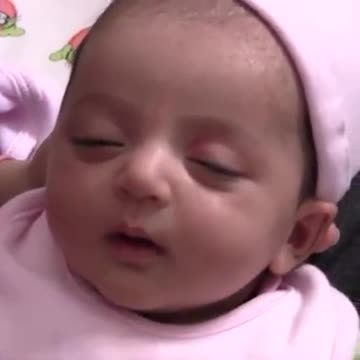 Baby's cute innocent moment