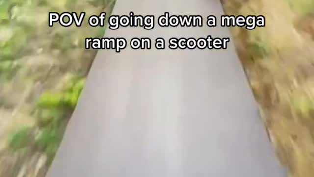 POV of going down a mega ramp on a scooter