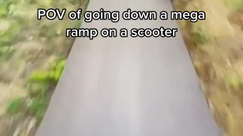 POV of going down a mega ramp on a scooter