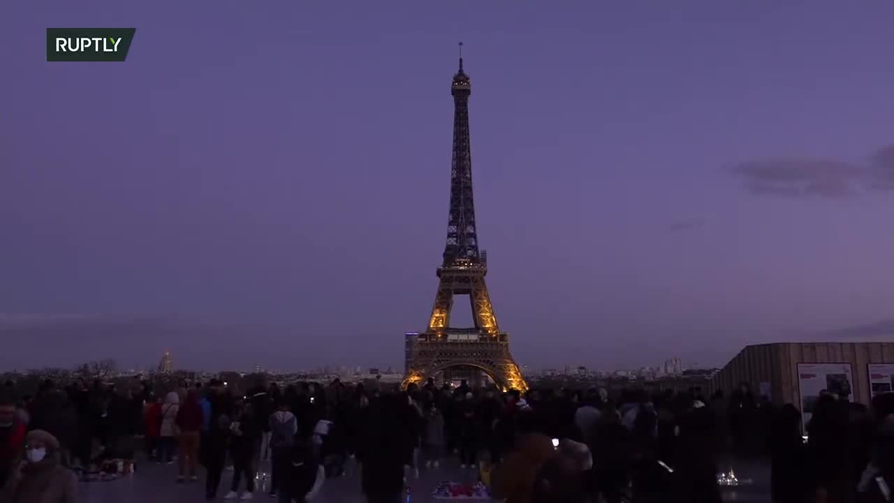 Eiffel Tower lit up in blue and yellow in solidarity with Ukraine
