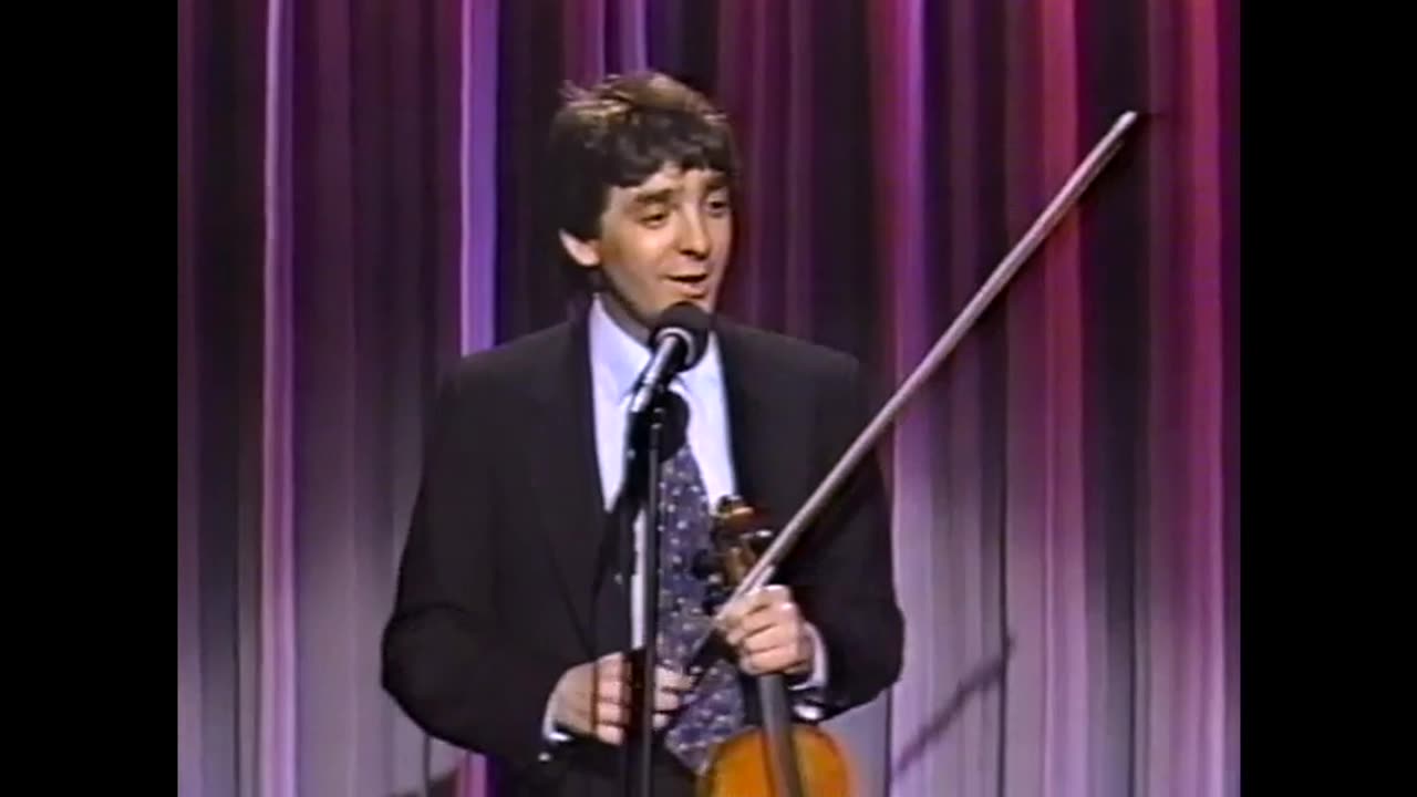 January 13, 1990 - Hugh Fink Delivers Laughs on 'Comic Strip Live'