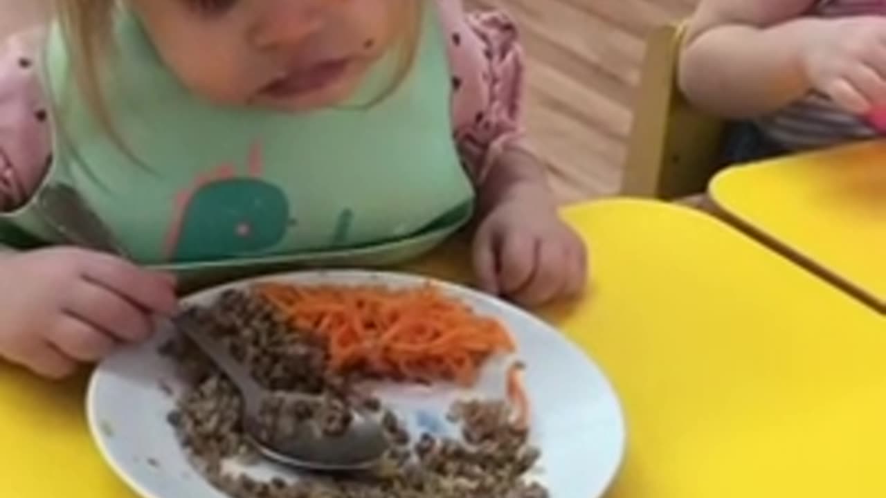 Tired little girl hilariously falls asleep during meal time