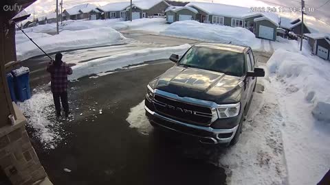 Roof raking the snow out of my gutters