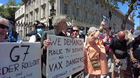 Piers Corbyn dances outside Downing Street at the We Are The Resistance protest in London