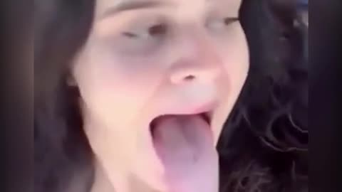 This girl has a very long tongue