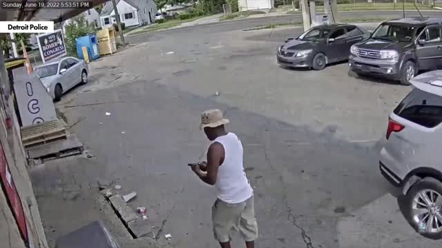 Horrifying Video Shows Detroit Sicko Aiming Gun at Man Holding Baby