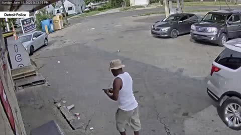 Horrifying Video Shows Detroit Sicko Aiming Gun at Man Holding Baby