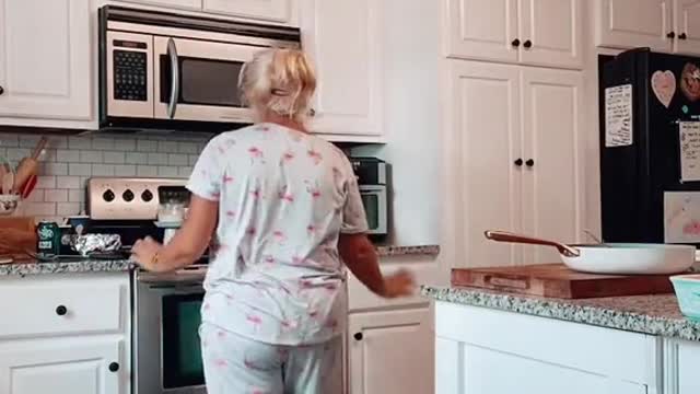 my way to cook dinner still wearing my pajamas and uncombedMe onhair at5pm