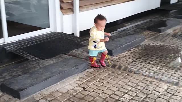 Enjoying the water, Amazon water baby, Wellington boots
