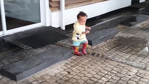 Enjoying the water, Amazon water baby, Wellington boots