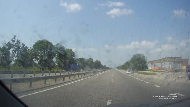 Car Slams into Protective Barrier