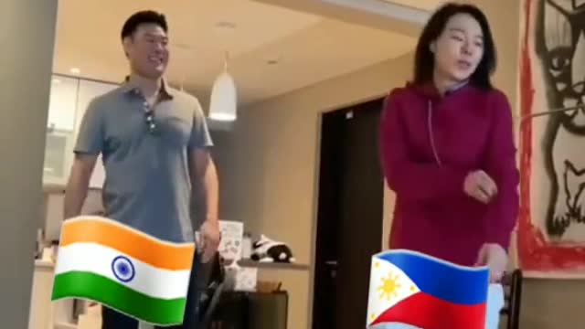 Indian boy kissing Philippine girl