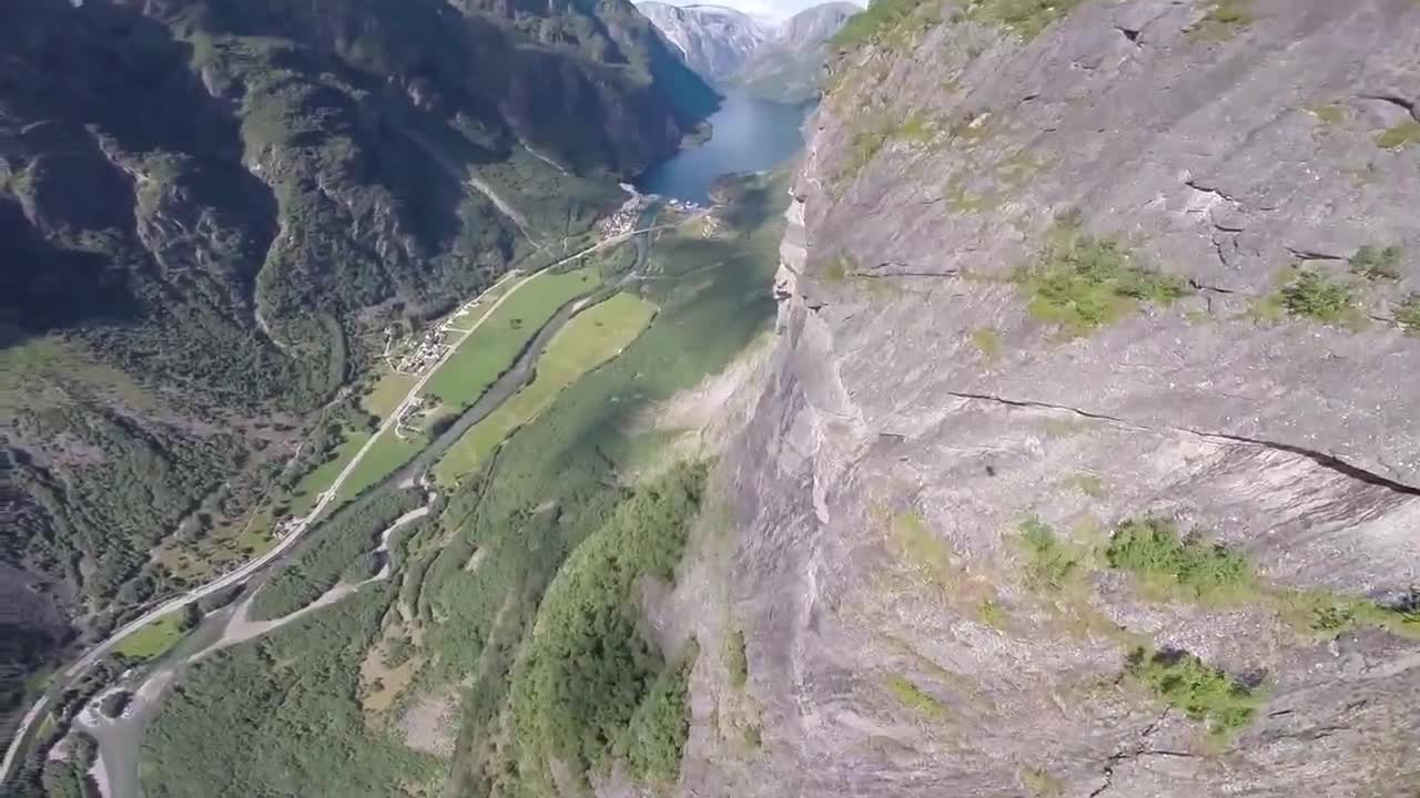 Wingsuit proximity flying over amazing Norway