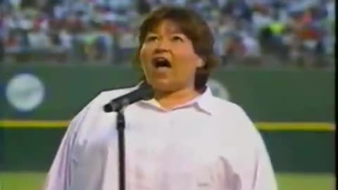 Roseanne singing the national anthem